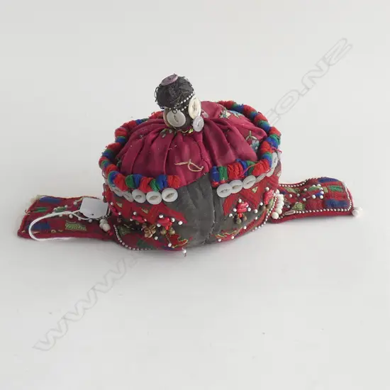 An embroidered child’s cap, possibly Kohistan, Northern Pakistan…